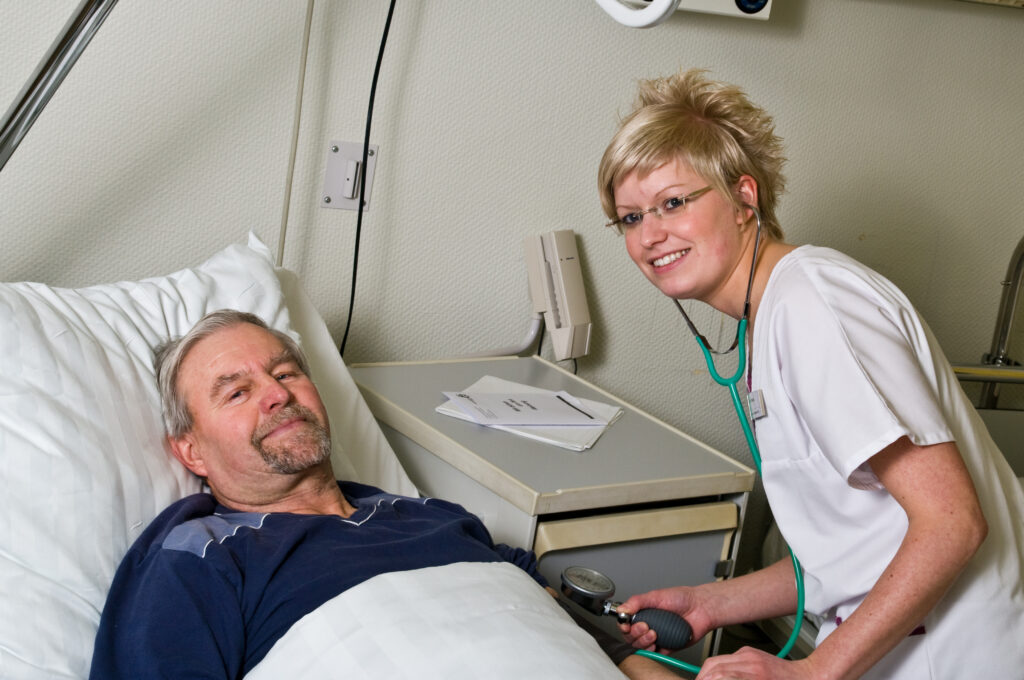 Krankenschwester und männlicher Patient