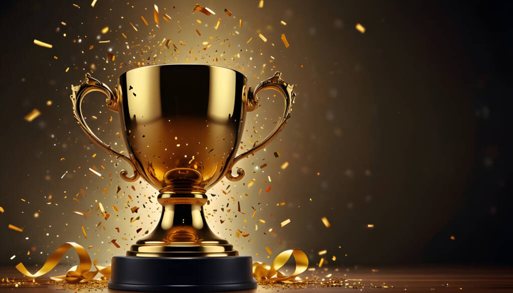 Champion trophy cup with falling confetti and streamers background.